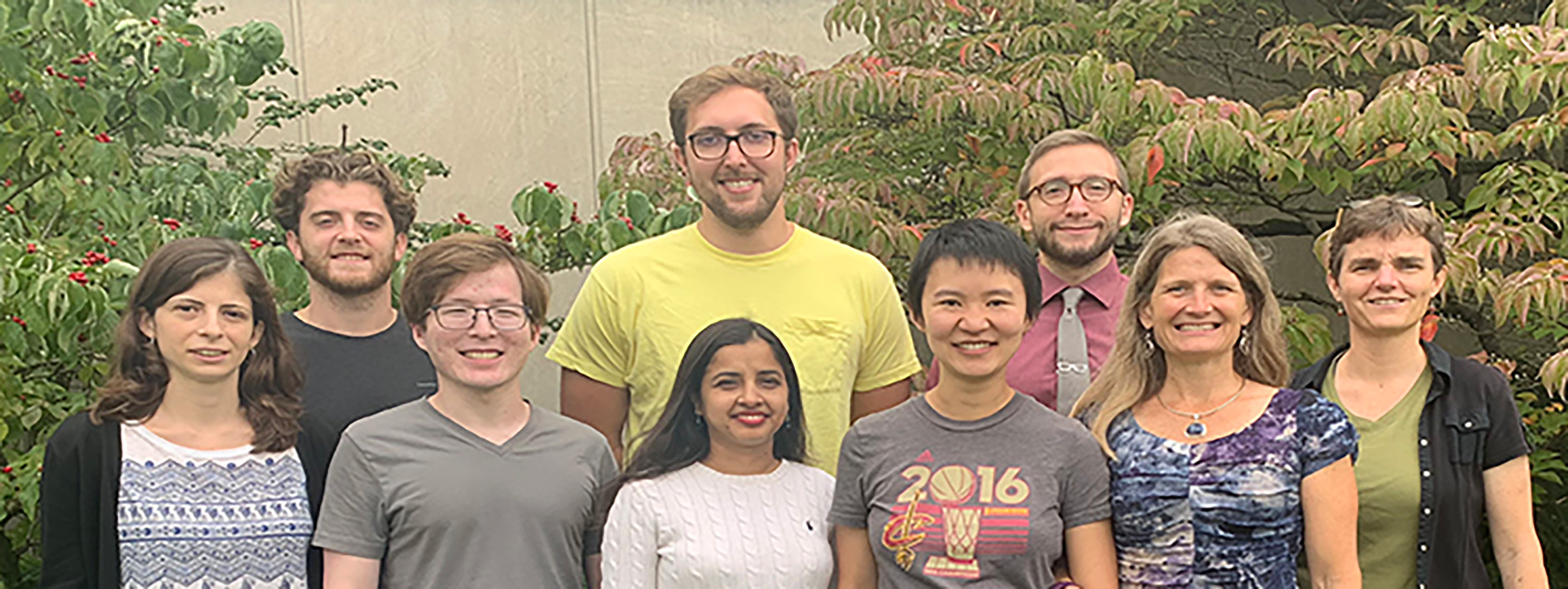 Lab Member Group Photo 2018 Past lab members standing outside together for a group photo.