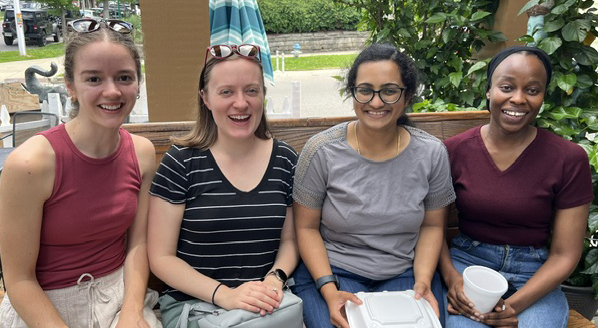 Four members of the lab celebrating